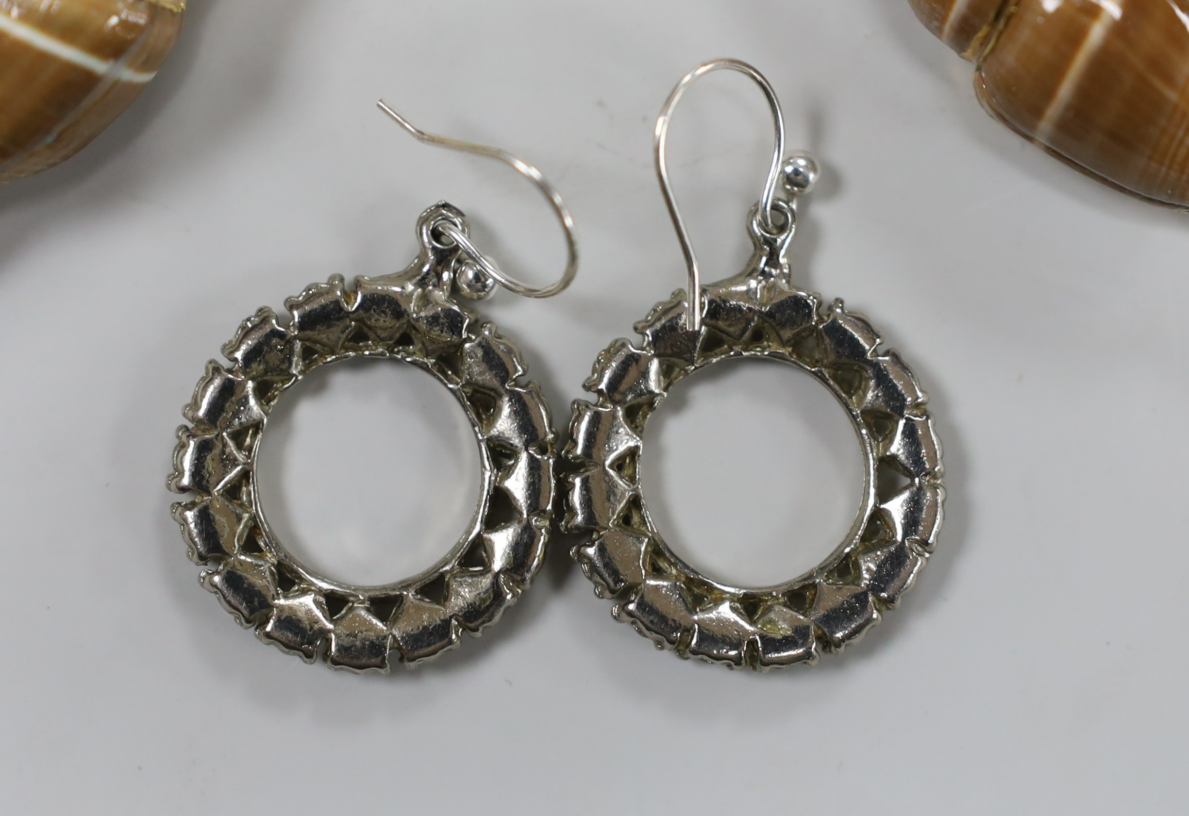 Two pairs of earrings, including paste set and mounted shell.